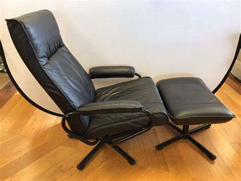 Today, the company has shifted its market slightly to offering lower priced items at big lots and similar stores. Danish Mid-Century Modern Black Pebbled Leather Recliner Lounge Chair and Ottoman at 1stdibs