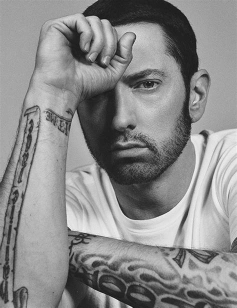 Eminems 9 Tattoos And Their Meanings Body Art Guru