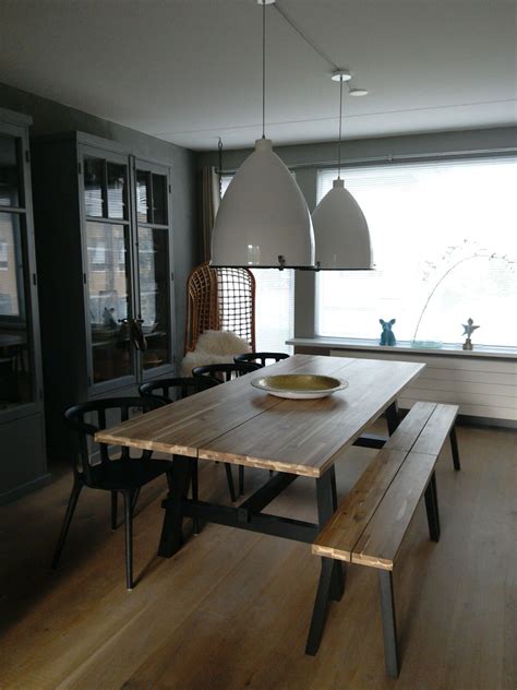Dining tables are hot spots even when there's no food on them. Ikea/ Table Skogsta/ Chairs PS 2012/ Bench Skogsta (legs ...
