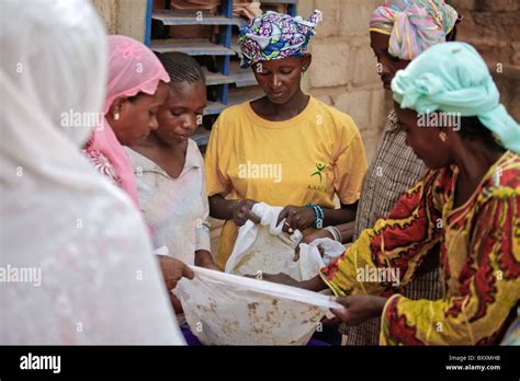 In Ouagadougou Burkina Faso Fulani Women Work Together To Make A