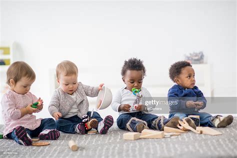 Babies Playing Together In Preschool High Res Stock Photo Getty Images