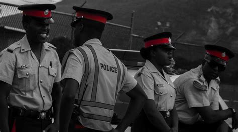 jamaican police men on duty jamaicans people color splash