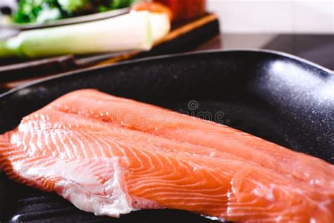Pink Salmon Fillet In A Frying Pan Before Cooking It Stock Image
