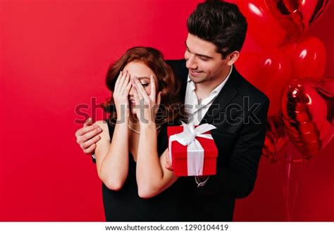 Стоковая фотография 1290104419 Brunette Man Making Surprise Girlfriend Valentines Shutterstock