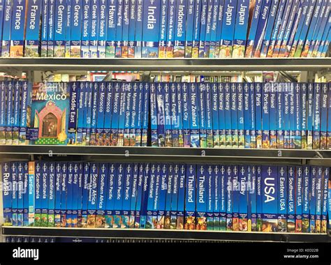 A Collection Of Lonely Planet Travel Books On Various Countries Stock