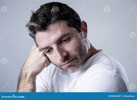 Man With Blue Eyes Sad And Depressed Looking Lonely And Suffering