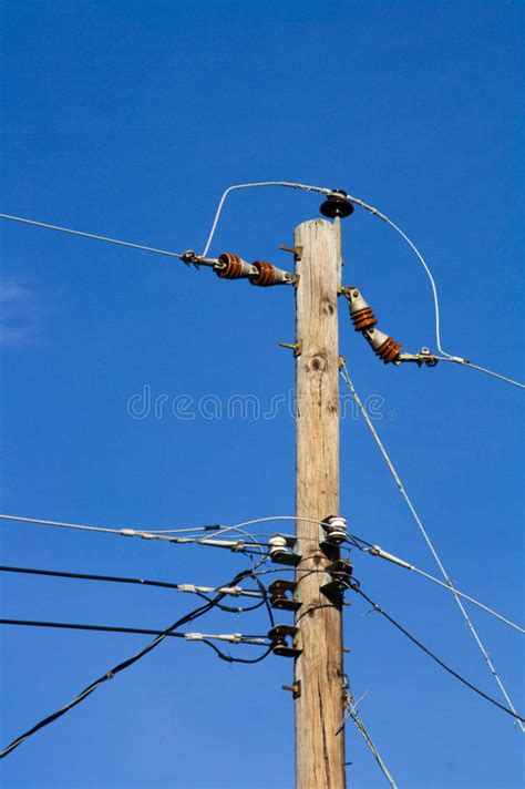 Wooden Utility Pole With Power Lines And Transformer Stock Photo
