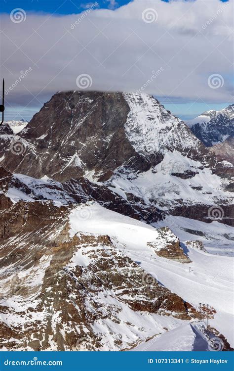 Winter Panorama Of Mount Matterhorn Covered With Clouds Alps