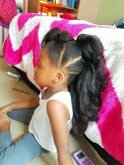 Sometimes natural hairstyle speaks volume. Long faux-hawk ponytails. Kid natural hair style ...