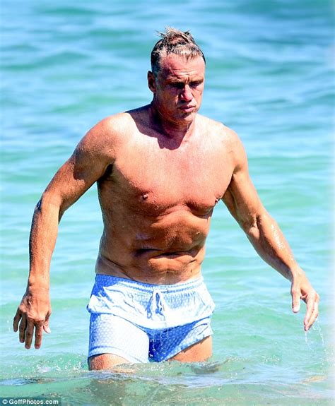 Dolph Lundgren Shows Off His Fit Physique As He Holidays In Saint