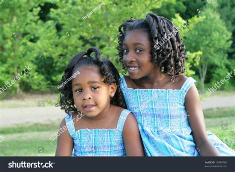 Two African American Sisters Playing In A Park Stock Photo 13980766