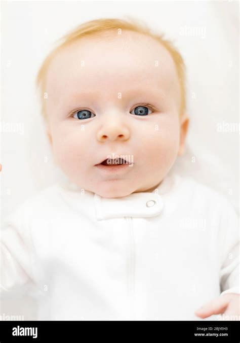 Portrait Of Baby Boy 2 3 Months Lying On Bed Stock Photo Alamy