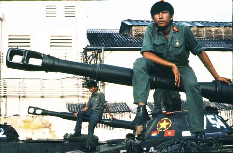 Tankers Of The Vietnamese Armored Corps Resting On The Barrel Of Their