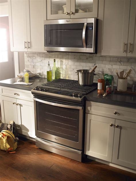 Venting overhead can include a microwave. Why Your Over the Stove Microwave Turns On Randomly ...