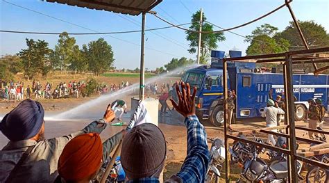 Police Use Tear Gas Water Cannons Trucks To Prevent Farmers From