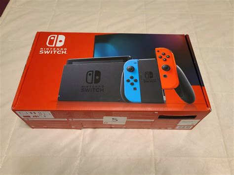 Nintendo Switch 32GB Console (with blue and red Joy-Cons) - iCommerce ...