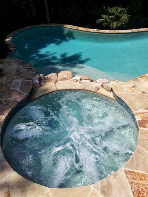 Spa And Free Form Pool Traditional Swimming Pool And Hot Tub Atlanta By Hearthstone Luxury
