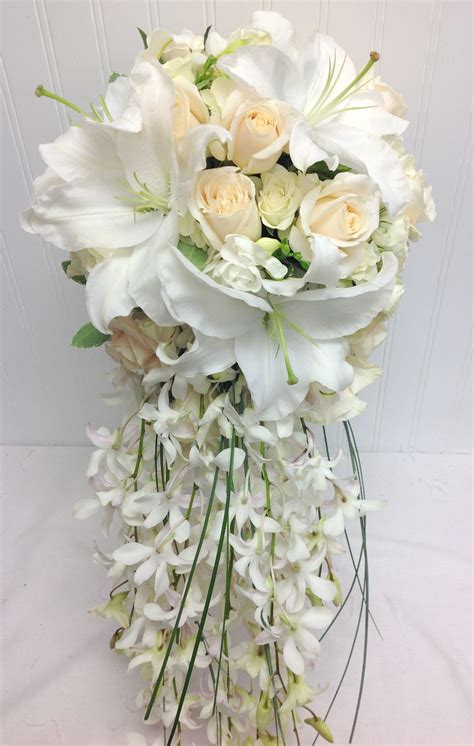 White Cascade Bridal Bouquet With White Lilies Roses Orchids Freesia
