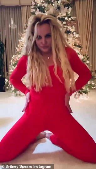 Britney Spears Slips Into A Sexy Red Bodysuit As She Recreates Outfit From Famous Music Video