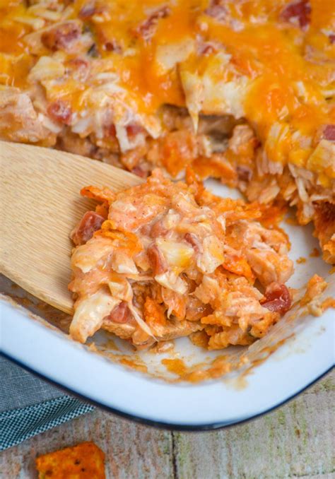 Sprinkle 1/2 the chips over chicken layer and top with 1/2 the cheddar cheese. Cheesy Chicken Doritos Casserole - 4 Sons 'R' Us