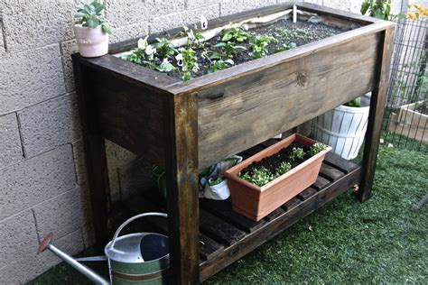 Now you could fill it up with dirt and plant your plants. Ana White | Raised Planter Box - DIY Projects