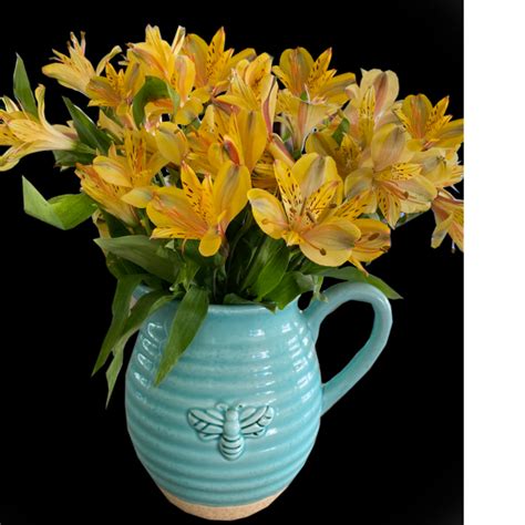 The perfect gifts and flowers, whether it's a special day or any day. Busy Bee Pitcher with Alstromeria - DiBella Flowers & Gifts