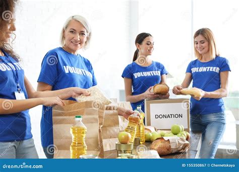 Team Of Volunteers Collecting Food Donations Stock Image Image Of
