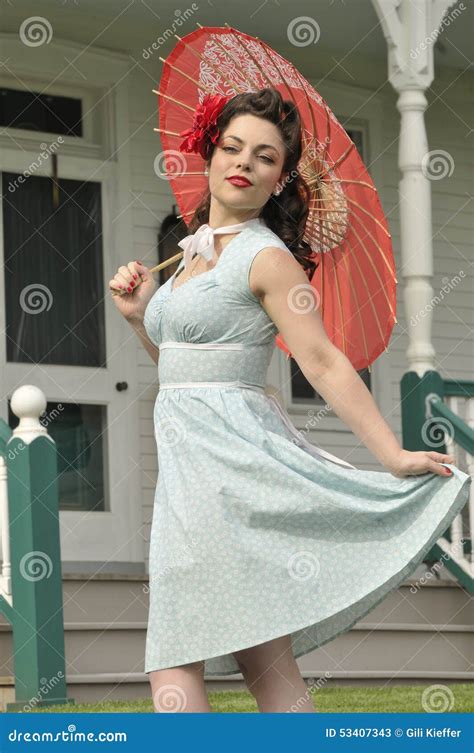 Playful Pin Up Girl With A Red Parasol Stock Photo Image 53407343
