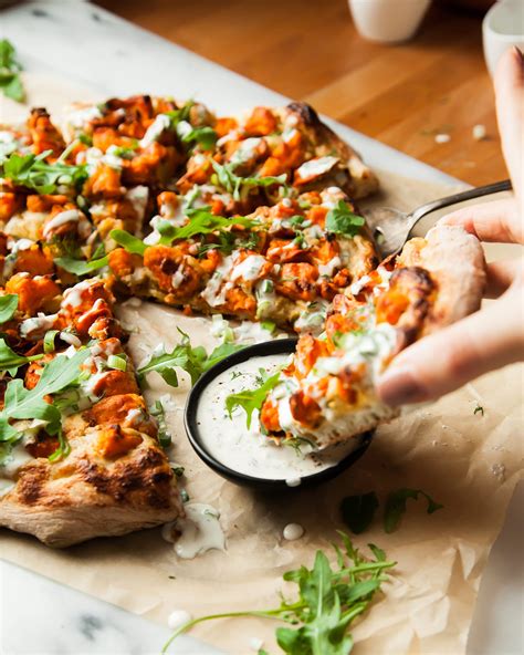 BUFFALO CAULIFLOWER PIZZA W ROASTED ONION CREAM The First Mess