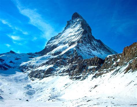 The Dramatic Pyramidal Peak Of The Matterhorn—the Iconic Mountain