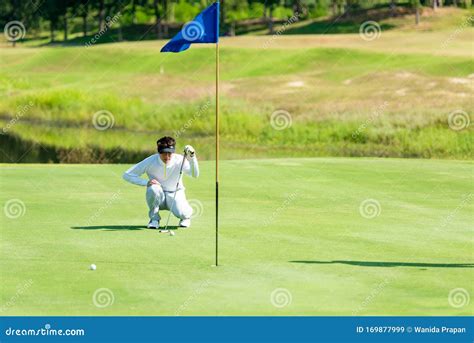 Golfer Playing GolfÂ Ball On Green Grass Stock Image Image Of Happy
