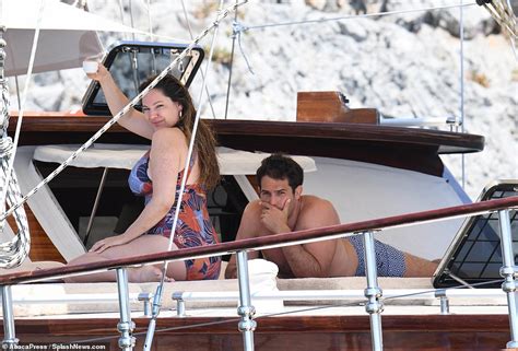 Kelly Brook Displays Her Showstopping Curves In Plunging Swimsuit
