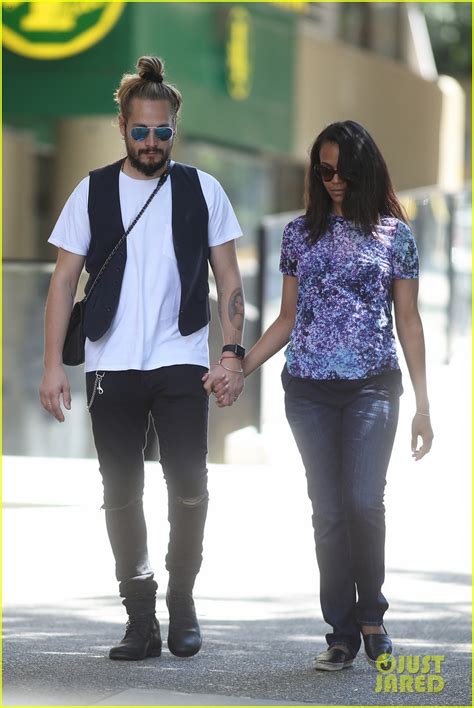 zoe saldana spends her birthday at the aquarium with hubby marco perego and the twins photo