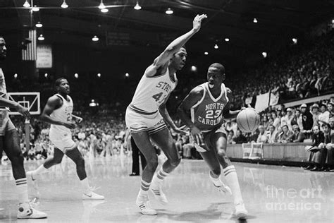Michael Jordan Dribbling Past Defender Photograph By Bettmann