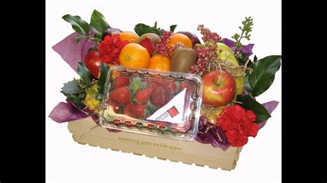 Start by having the largest fruit at the bottom of the basket. Fruit basket decoration for wedding - YouTube
