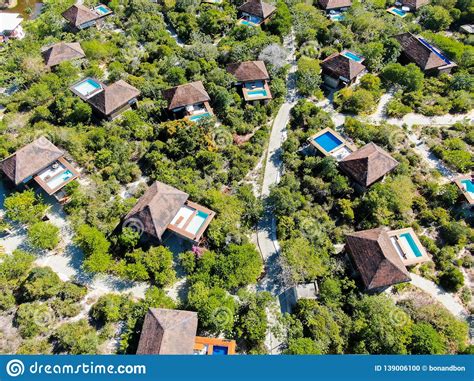 Please inform luxury villa with pool in tropical garden in advance of your expected arrival time. Aerial View Of Luxury Villa With Swimming Pool In Tropical ...