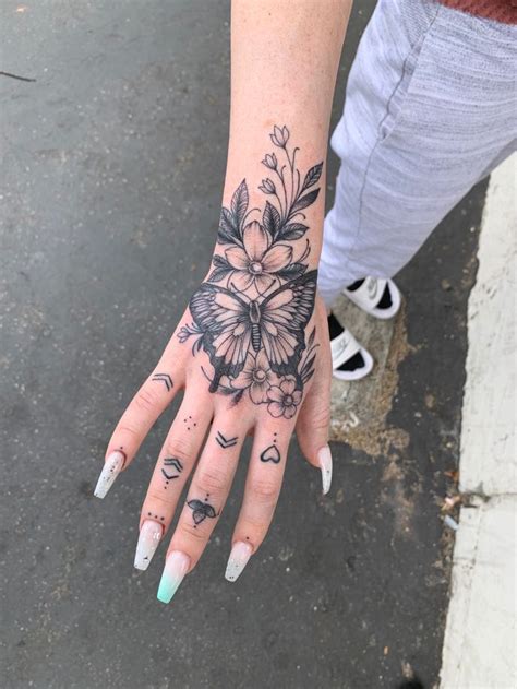 The full hand tattoo, finger tattoos, the clock reminder hand tattoo can also be one of the best because it is personal. Butterfly hand tattoo - alexktattoo on Instagram in 2020 ...