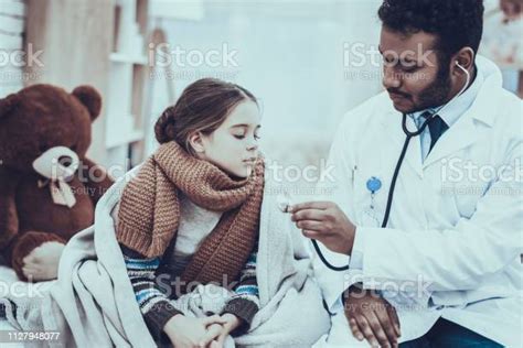 Doctor Is Seeing Patient At Home Stock Photo Download Image Now