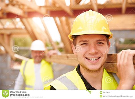 Apprentice builder is a new magazine that targets the next generation of builders. Builder And Apprentice Carrying Wood On Construction Site ...