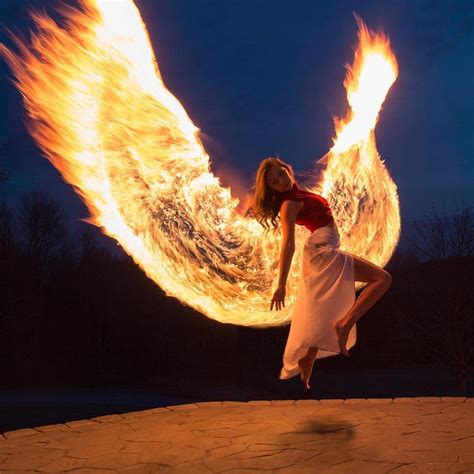 The phoenix is a red, purple, gold and yellow mix in various mythologies. Beautiful Light Painting Photos of a Young Woman Rising ...