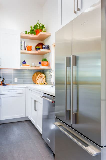 Stainless Steel Appliance In White Contemporary U Shaped Kitchen