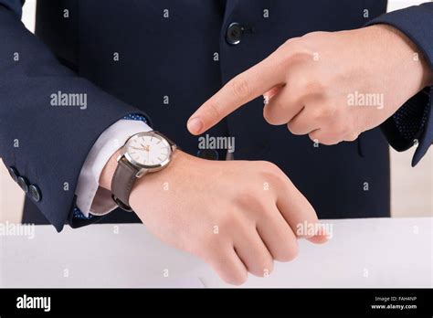 Man Pointing At The Wristwatch Stock Photo Alamy