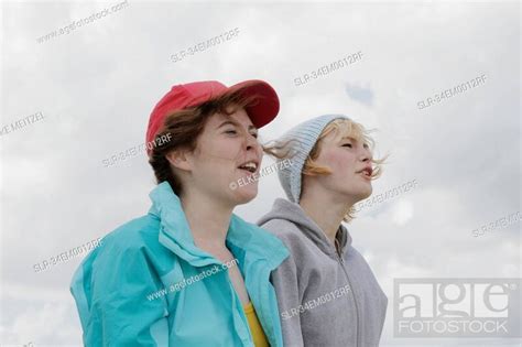 Girls Shouting Outdoors Stock Photo Picture And Royalty Free Image