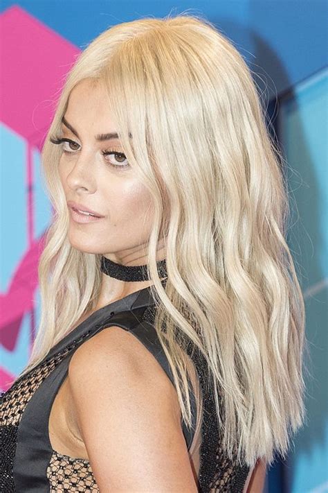 Bebe Rexha Wavy Platinum Blonde Blunt Cut Loose Waves Hairstyle