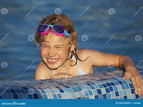 Joyful Child At Edge Of Swimming Pool Stock Image Image Of Happiness