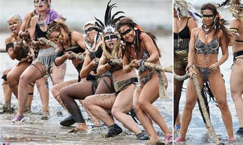 Amazonian Girls Get Caked In Mud For Tug Of War Event Daily Mail Online