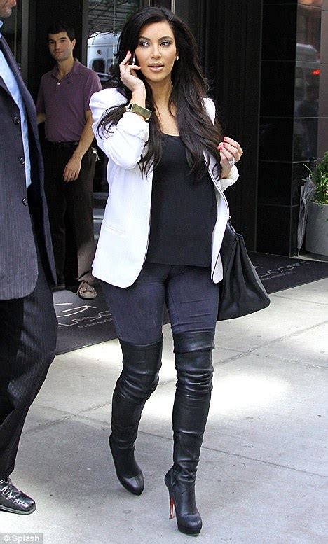 Kim Kardashian Trots Out Her Favourite Thigh High Boots To Watch The Us Open Daily Mail Online