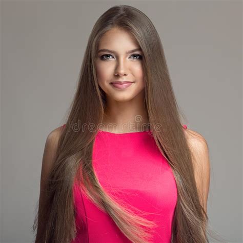 Portrait Of A Beautiful Brunette Woman With Long Straight Hair Stock
