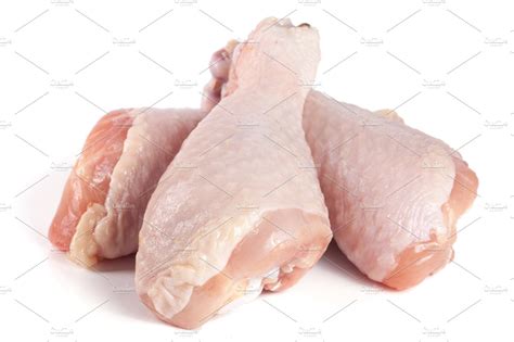 Three Raw Chicken Drumsticks Isolated On White Background Containing