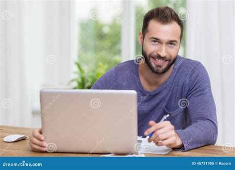 Smiling Businessman Working On A Laptop Stock Image Image Of Domicile Computer